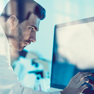 Man looking at computer screen