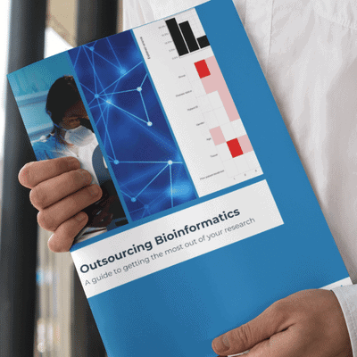 Man holding the Outsourcing Bioinformatics Buyer's Guide